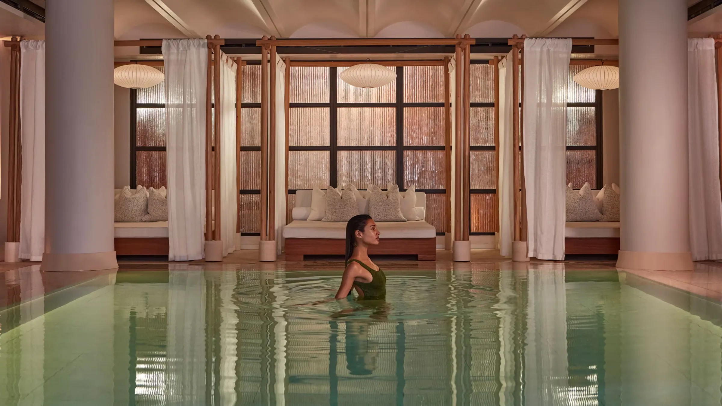 The Claridge's Spa treatment room and pool area